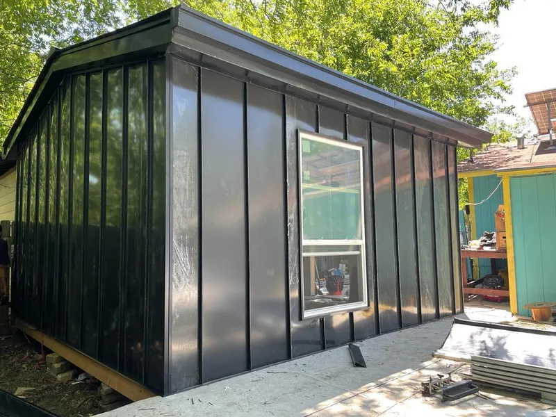 Black standing seam metal wall panels for Roof Inspection in Rancho San Diego