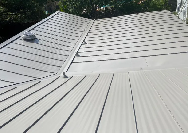 Solar attic fan installed on a metal roof for Roof Ventilation in Rancho San Diego
